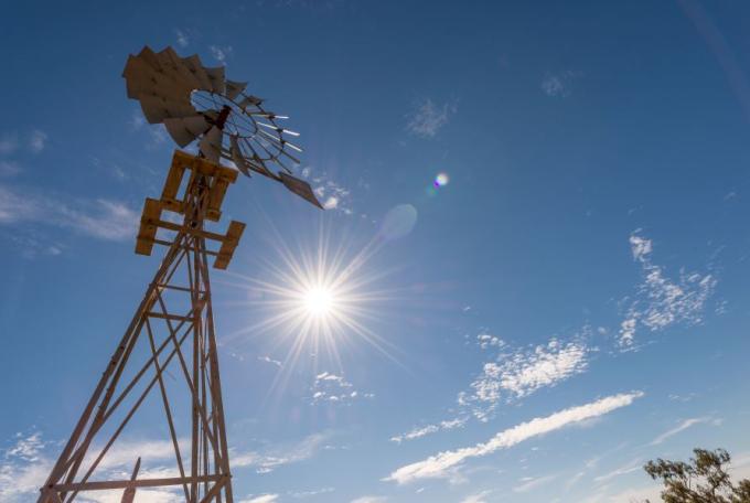 Windmill against blue sky